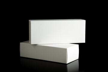 Package box rectangle, blank advertise template for products packaging. White color empty closed cardboard container against black background
