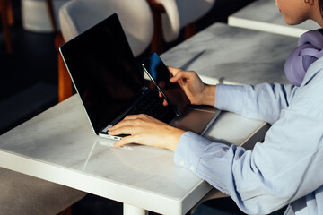 woman hands near laptop close-up