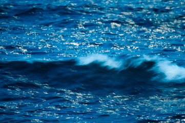 Waves with strong wind after a storm, abstract texture, Patagonia, Argentina.