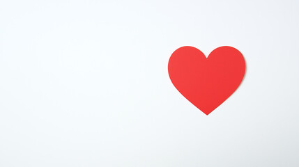 Red heart shape on blank white background with copy space