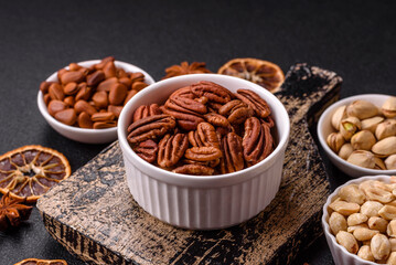 Delicious nutritious pecan nuts in ceramic bowl