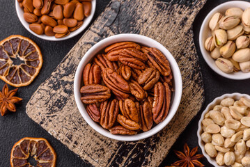 Delicious nutritious pecan nuts in ceramic bowl