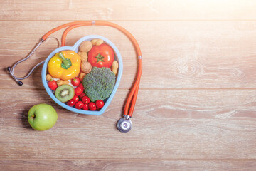 Heart shaped dish with vegetables and warm sun flare