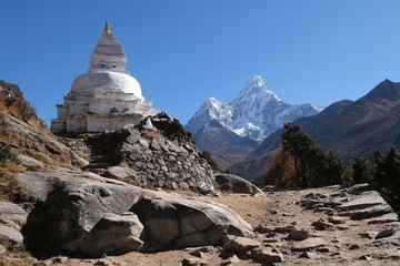 Amazing scenery of trekking Tengboche to Dingboche during trekking Everest Base Camp with chorten (stupa) and Ama Dablam on horizon. Himalayas, Sagarmatha National Park, Nepal