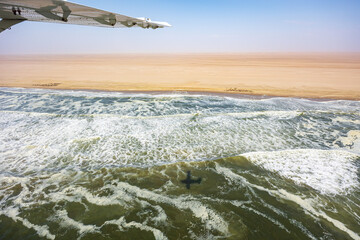 aerial view of the coast of the sea with scenic flight