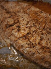 Delicious fish baking on parchment paper for christmas dinner in prague