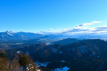 Fototapeta premium View of forest covered hills and mountain in Gorenjska, Slovenia
