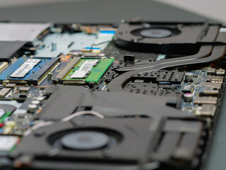 The cooling fan system element, laptop computer cooler, close-up, Repairing computer.