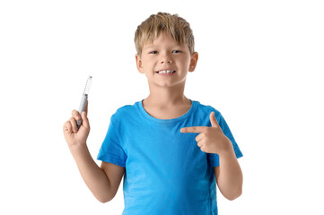Little diabetic boy pointing at lancet pen on white background