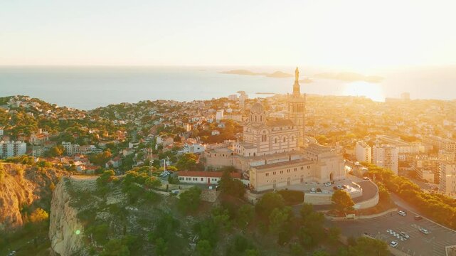 Aerial view of the Notre-Dame de la Garde church at sunset in southern France.