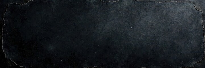 Deep black, textured surface; chalky smudges, worn edges , rough, education