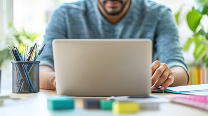 Career-focused individual updating a personal blog on career growth. Featuring laptop and content drafts