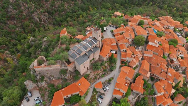 Aerial view of Eus, the medieval hilltop town in Pyrenees mountains, France. 