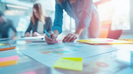 Creative team brainstorming with digital tools and vibrant office decor. Featuring advanced technology and dynamic design