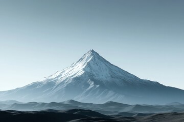 Fototapeta premium Snow-capped mountain peak rises majestically above surrounding rugged terrain under clear sky. Generative AI