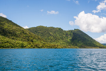 New Zealand’s Lake Tikitapu, in the North Island’s Bay of Plenty Region, is more commonly known as Blue Lake and was formed by a lava dam. 