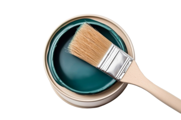 A paintbrush is in a green paint can