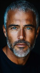 Obraz premium Striking Portrait of a Mature Man With Blue Eyes