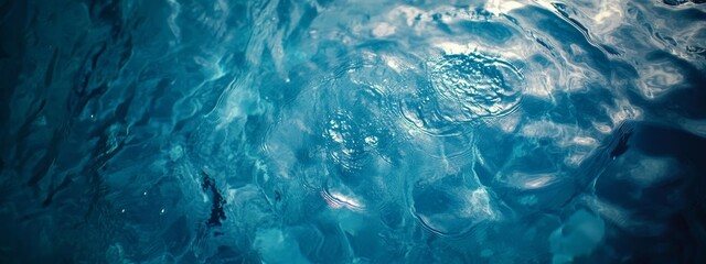 Abstract underwater scene with deep blue water texture.