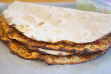 A Stack of Flavorful and Delicious Flatbreads Enhanced with Spices
