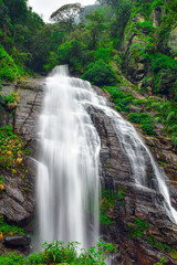 Fototapeta premium waterfall in the forest, Kolapathana ella at Mandaramnuwara 