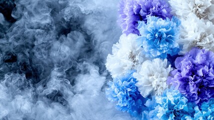 Fototapeta premium Blue, white, purple flowers in smoke.