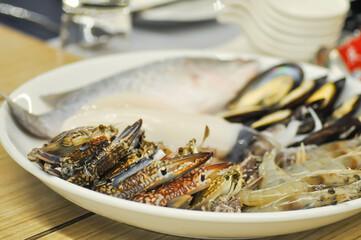 raw crab , raw shrimp , raw fish and raw shell