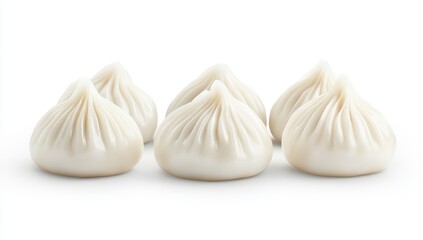 Obraz premium Six steamed dumplings arranged on white background.
