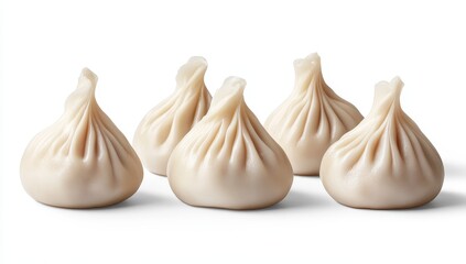 Obraz premium Five delicate, plump, steamed dumplings isolated on white.