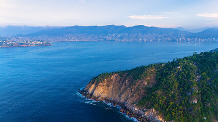 Aerial shot revealing the bay of Acapulco from Punta Bruja. An angle that reveals the magnitude of this prized Mexican tourist destination.