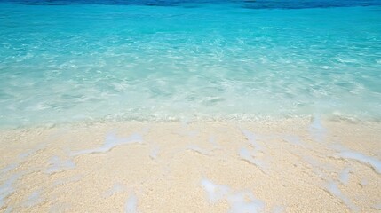 Obraz premium Crystal Clear Turquoise Ocean Waves Gently Embrace Pristine Sandy Beach Shore : Generative AI