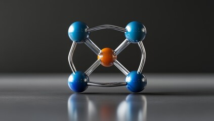 Obraz premium Abstract metallic molecule model with orange and blue spheres.