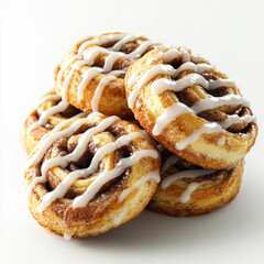 Warm cinnamon rolls with icing drizzle, inviting and delicious isolated design on white background