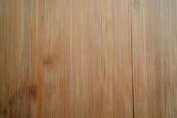 Naklejka premium Close-up view of a natural bamboo surface. Beautiful wood texture. Perfect for interior design inspiration.