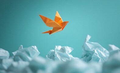Origami bird soaring above crumpled paper.
