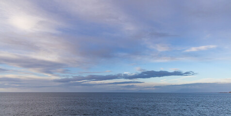 Serene Ocean Under a Vast Expansive Blue Sky