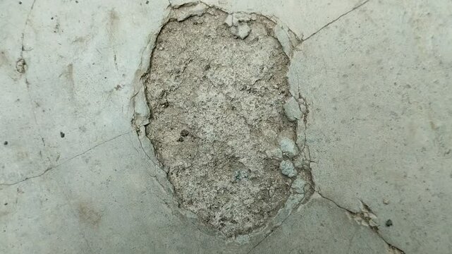 Concrete surfaces are peeling or spalling. due to extreme weather