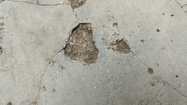 Concrete surfaces are peeling or spalling. due to extreme weather