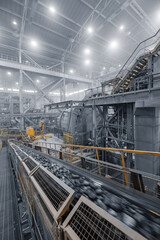 Industrial ball mill grinds ore at mining and concentrating plant. Concentration factory for...