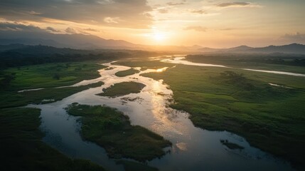 Aerial view of a river at sunset.