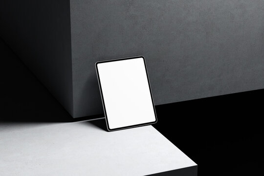 Tablet Mockup Display on Minimalist Platform with Soft Lighting

