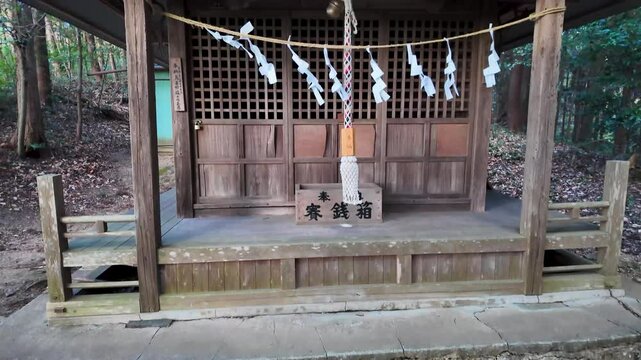 Shide paper streamers fluttering at a Shinto shrine in Japan