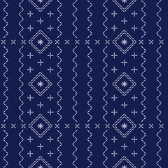 Sashiko embroidery seamless vector pattern. Needlework fabric design. Japanese embroidery ornament white stitches on the indigo blue background. 