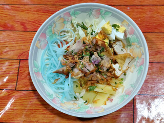 Soto Ayam in Indonesia. Soto ayam is a traditional Indonesian dish that uses ingredients such as shredded chicken, potatoes, eggs, rice vermicelli, bean sprouts with a delicious sauce.