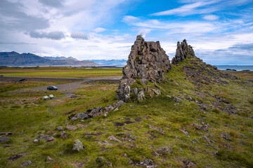 Landscape with basalt dams and rock formations in the Þvottaá area near Álftafjörður bay in...