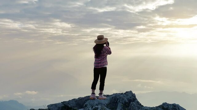 Tourist taking photography and enjoy nature panoramic landscape at Doi pha mon mountains in Chiang rai, Thailand.
