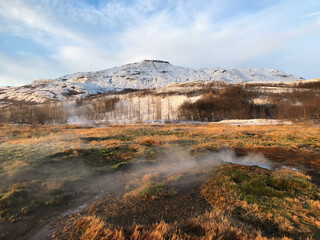 Iceland snow-capped mountains and hot springs