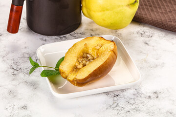 Baked quince with honey and cedar