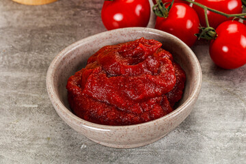 Red tomato paste in the bowl