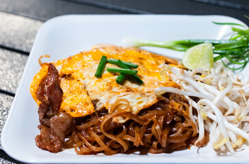 Korat stri fried noodle (Pad-Mee-Korat) in white plate.